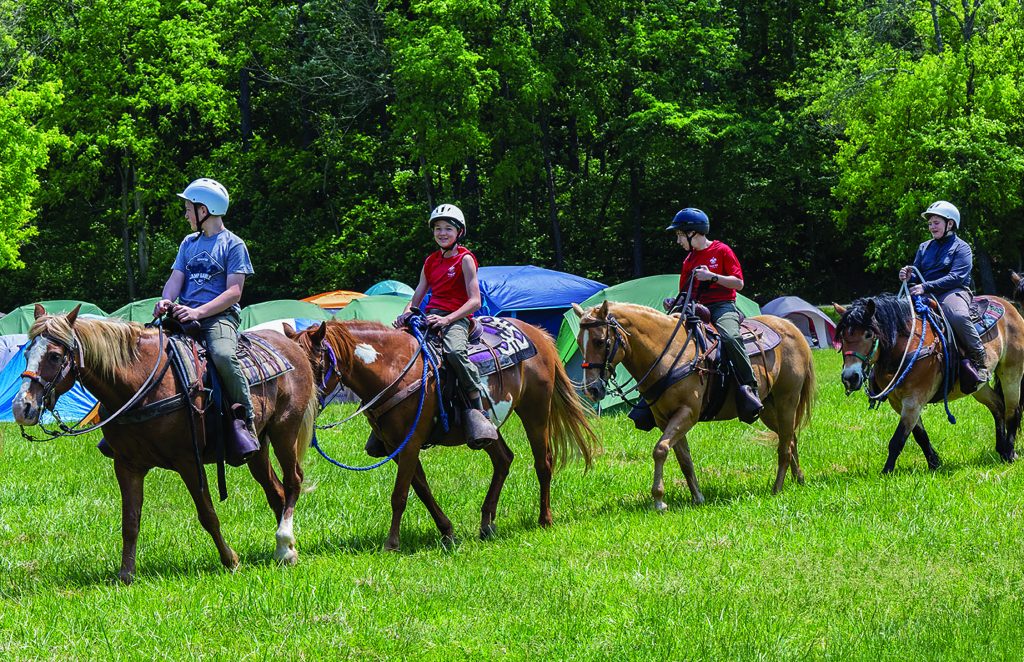 Riding horses at Beaumont Scout Reservation - From Scout Life Magazine